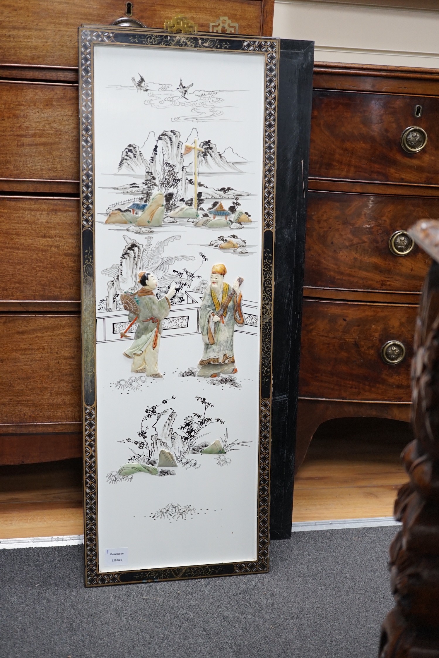 A set of four Chinese lacquer and soapstone mounted panels, 95 x 33cm